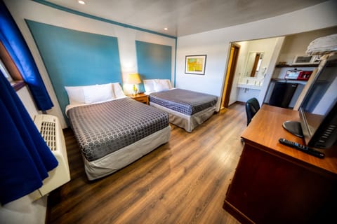 Basic Room, 2 Queen Beds, Non Smoking | Free WiFi, bed sheets