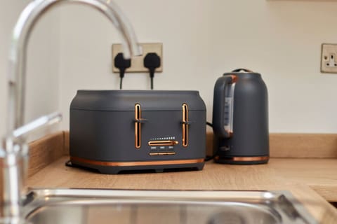 A fully equipped kitchen with everything you need to prepare a home cooked meal.