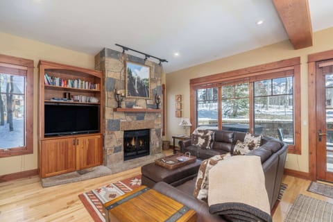 Living room: Smart TV (60” Sony), gas fireplace, radiant heat, no A/C