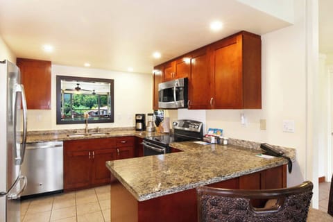 Full kitchen with all the amenities including a full Refrigerator, Freezer, Oven, Range, Dishwasher, Microwave, Coffee Maker, Toaster, and Sink.