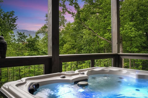 Relax & unwind with mountain views from the bubbling hot tub!