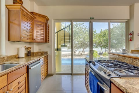 Full kitchen with pool and beach view