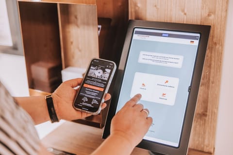 Check-in/check-out kiosk