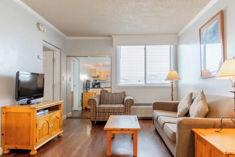 Suite, 1 Bedroom | Living area | 50-inch flat-screen TV with cable channels