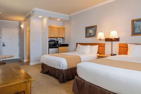 Suite, 2 Bedrooms | In-room safe, blackout drapes, iron/ironing board, travel crib