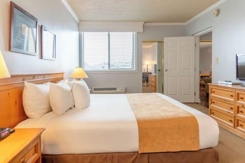 Suite, 1 Bedroom | In-room safe, blackout drapes, iron/ironing board, travel crib