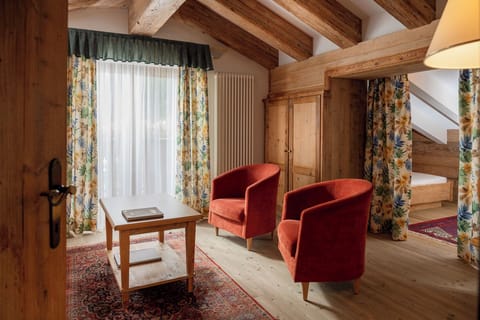 Suite | Premium bedding, down comforters, memory foam beds, minibar