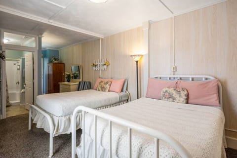 Room, 2 Double Beds | Premium bedding, individually decorated, individually furnished