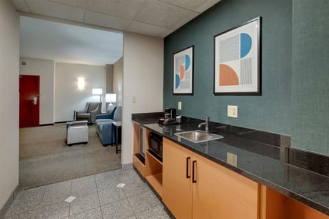 Desk, blackout drapes, iron/ironing board, free cribs/infant beds