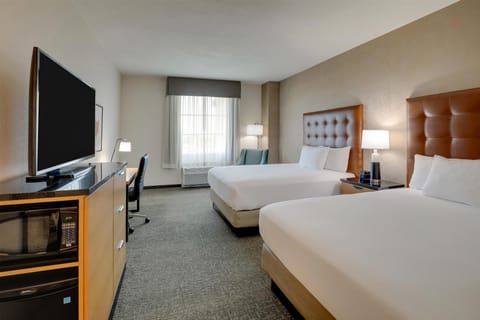 Desk, blackout drapes, iron/ironing board, free cribs/infant beds