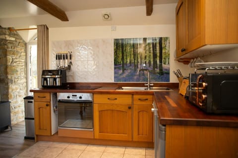 Kitchen with electric oven and air fryer