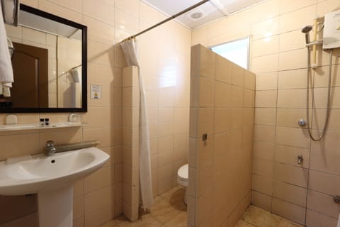 Standard Twin | Bathroom | Free toiletries, hair dryer, slippers, towels