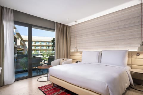 Superior Room, Balcony, Pool View | Down comforters, Select Comfort beds, minibar, in-room safe