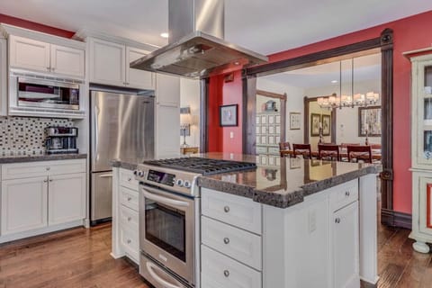 Main Kitchen: Large refrigerator and built in microwave - and the kitchen is stocked with all the basics and loads of dish ware