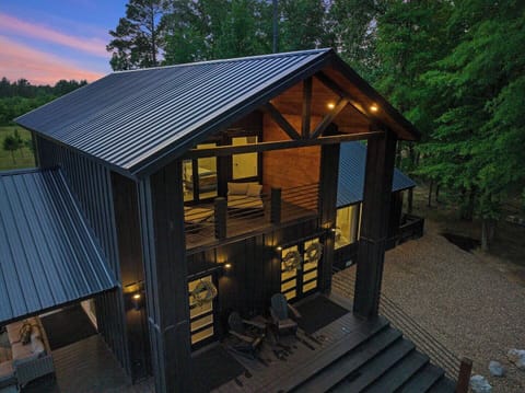 Escape to the tranquil elegance of Dogwood Manor!  Nestled in peaceful seclusion, this charming retreat offers the perfect blend of comfort, nature, and timeless beauty. 