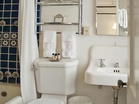 Bathroom | Eco-friendly toiletries, hair dryer, bathrobes, slippers