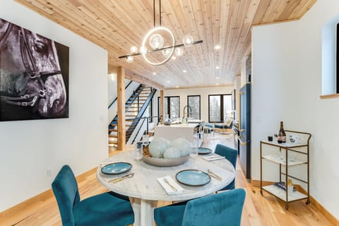 Dining room table seating for four people | Upper Level