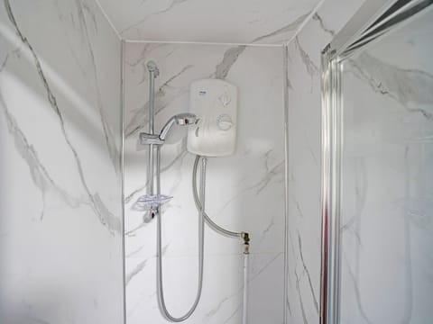 Shower, free toiletries, hair dryer, towels