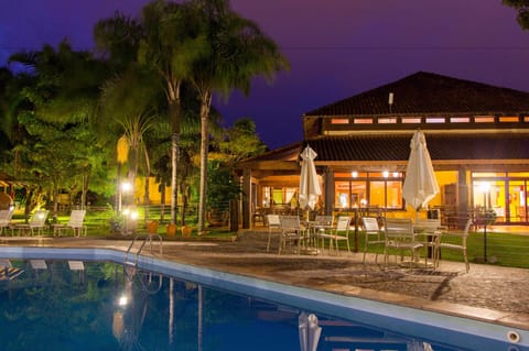 Indoor pool, outdoor pool, pool umbrellas