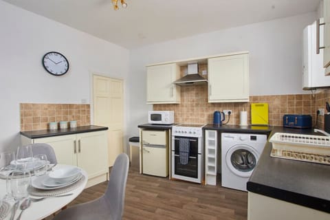 Enjoy the convenience of a kitchen ready for home cooking, with all key appliances and utensils provided.