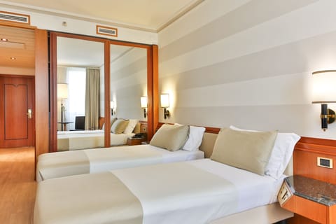 Classic Double Room, 2 Twin Beds | Down comforters, memory foam beds, minibar, in-room safe