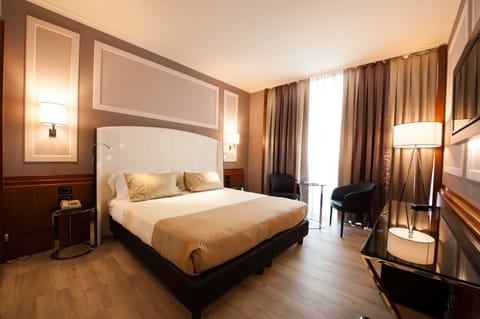 Down comforters, memory foam beds, minibar, in-room safe