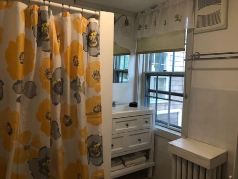 Garden Room | Bathroom | Shower, hair dryer, bathrobes, towels