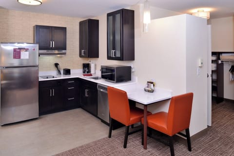 Studio, 1 King Bed | Private kitchen | Fridge, microwave, stovetop, dishwasher