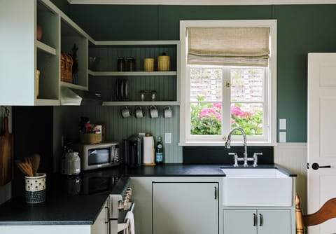 Deluxe Suite, Balcony, River View | Private kitchen | Microwave, coffee/tea maker, electric kettle, freezer