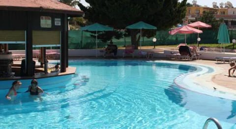 Seasonal outdoor pool, pool umbrellas, sun loungers