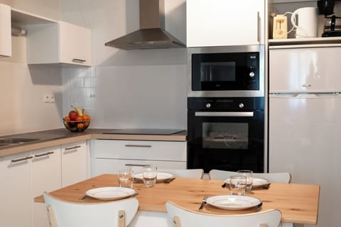 One-Bedroom Apartment | Private kitchenette | Fridge, microwave, coffee/tea maker, highchair