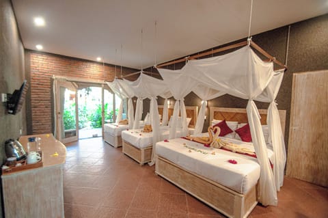 Deluxe Room, Multiple Beds, Balcony, Garden View | Free WiFi