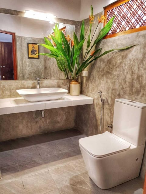 Deluxe Double or Twin Room, 4 Bedrooms, Lake View | Bathroom | Eco-friendly toiletries, bidet, towels, soap