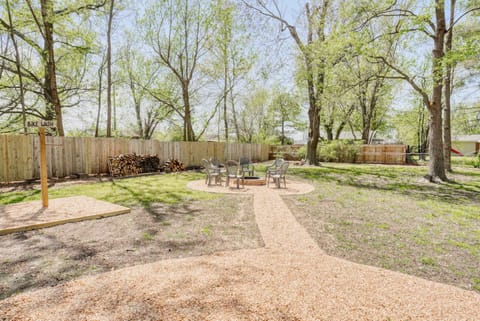 Follow the gravel path to a private fire‑pit circle nestled among mature trees—a perfect spot for s’mores and stargazing.