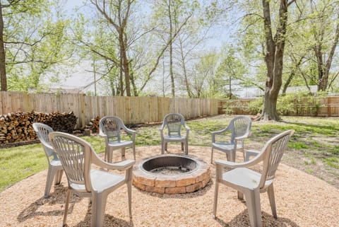 Circle of chairs around a stone fire pit invites s’mores and starry conversations.