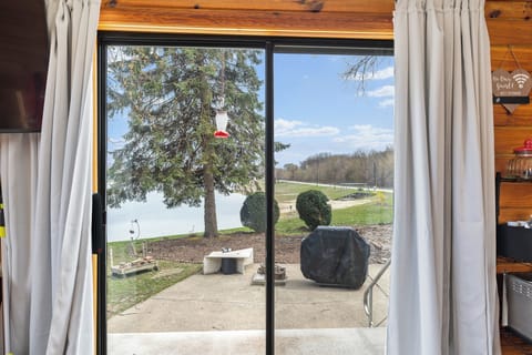Outside porch with grill and lake view