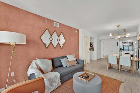 From the living room, step onto the connecting balcony to enjoy waterfront panoramas and beautiful sunsets.