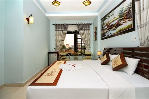 Deluxe Double Room, River View (Double Room ) | Living room | 24-inch LED TV with cable channels, TV