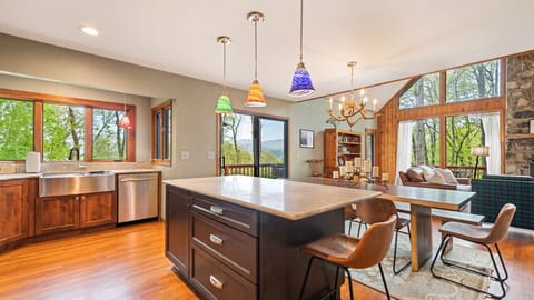 Enjoy meals and mountain views in this bright, inviting kitchen space.