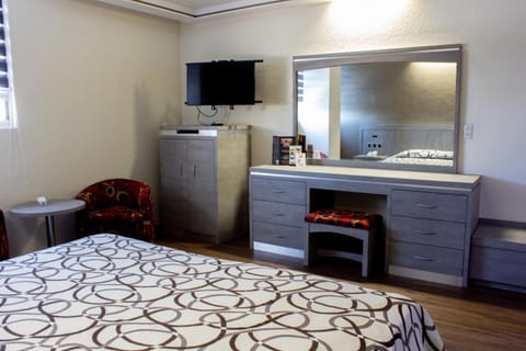 Blackout drapes, iron/ironing board, free WiFi, bed sheets