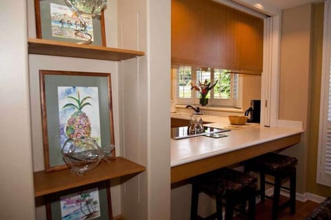 Slide up to this cozy breakfast bar and sip your morning coffee with a garden glow.