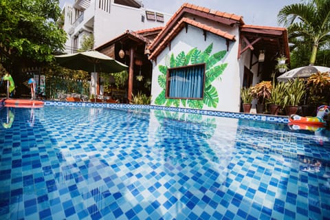 Outdoor pool, open 7:00 AM to 9:30 PM, sun loungers