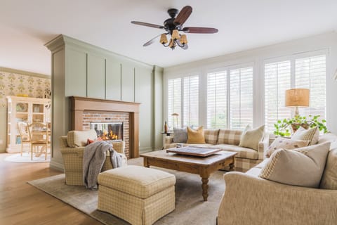 Cozy up by the warm fireplace in this inviting lounge.

