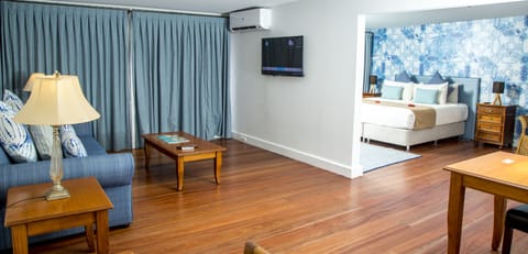 Garden View Penthouse Suite | In-room safe, blackout drapes, iron/ironing board, WiFi