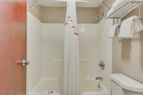 Standard Suite, 1 King Bed with Sofa bed, Non Smoking | Bathroom | Combined shower/tub, free toiletries, hair dryer, towels