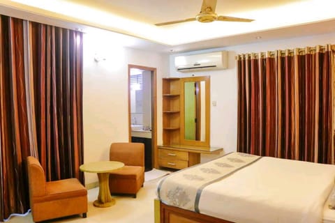 Deluxe Single Room, City View | Minibar, in-room safe, individually furnished, desk