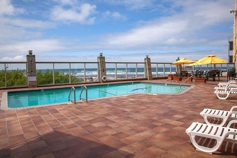 Outdoor pool, open 8:00 AM to 10:00 PM, pool umbrellas, sun loungers