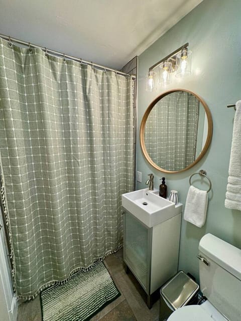 Refresh and unwind in a clean, stylish bathroom designed for comfort and simplicity.