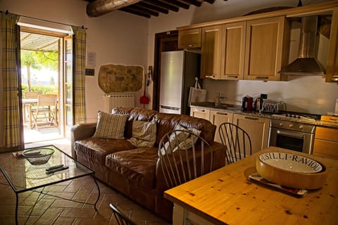 Living area including a fully equipped kitchen with dishwasher