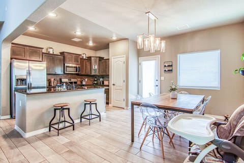 Dining Area with Open Kitchen and Living Room Views